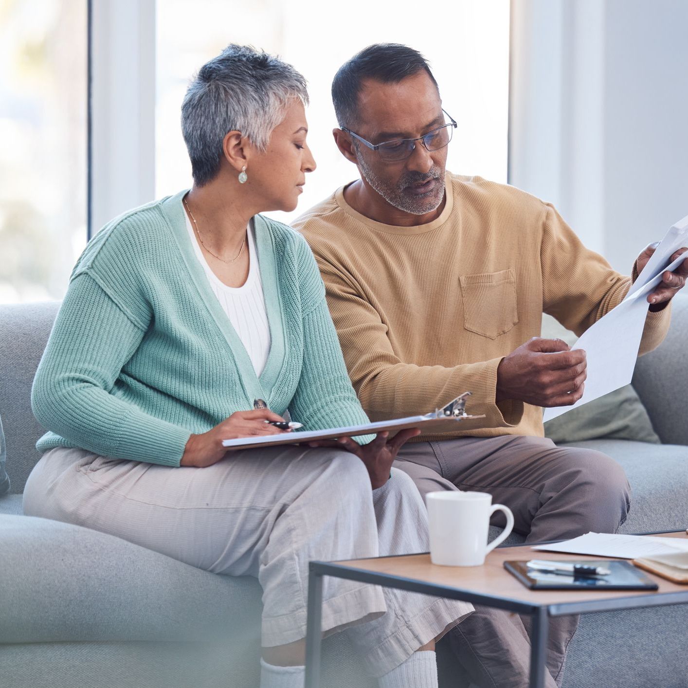 couple reading documents